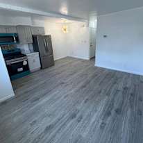 Updated kitchen with modern appliances's room
