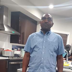 JOHN M KIARIE