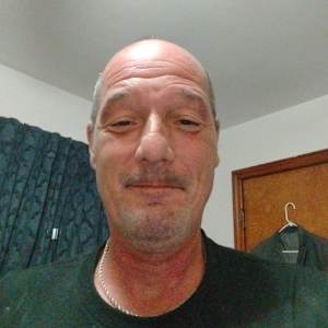 John E Ouge