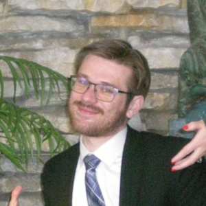 Erik J Wells