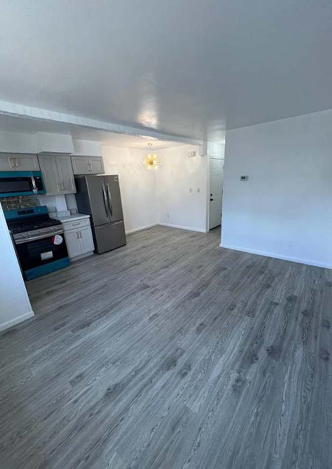 Updated kitchen with modern appliances's room