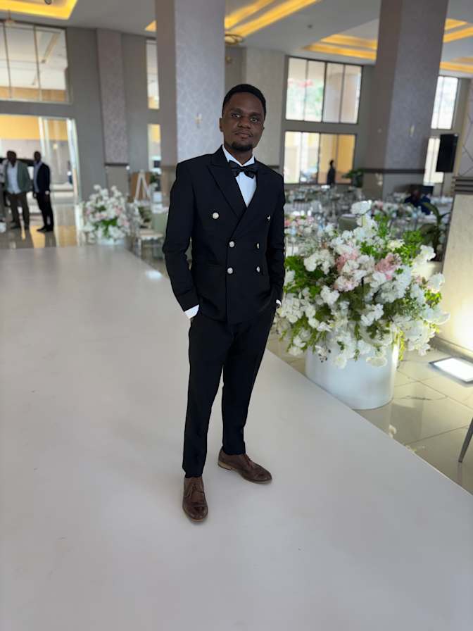 Rolland Troy Ayesiga