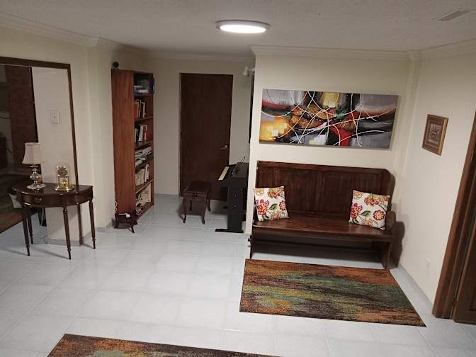 Large in house Basement Apartment shared only with a quite clean early thirties male professional's room