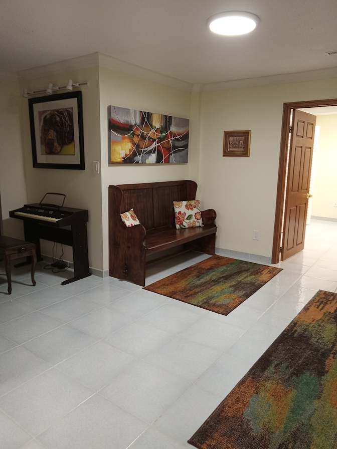 Large in house Basement Apartment shared only with a quite clean early thirties male professional's room