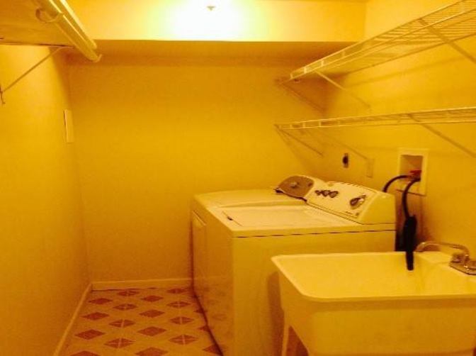1150 sq^2 Woodbridge bright basement has a separate entrance and its own laundry room.'s room