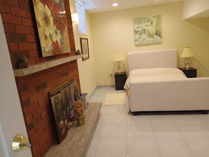 Large in house Basement Apartment shared only with a quite clean early thirties male professional's room