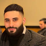 Amjad S Kharoof