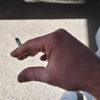 J.
