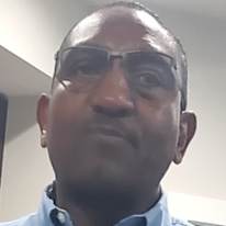 JOHN M KIARIE