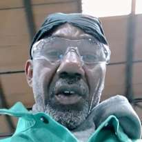 Reginald E Calvin